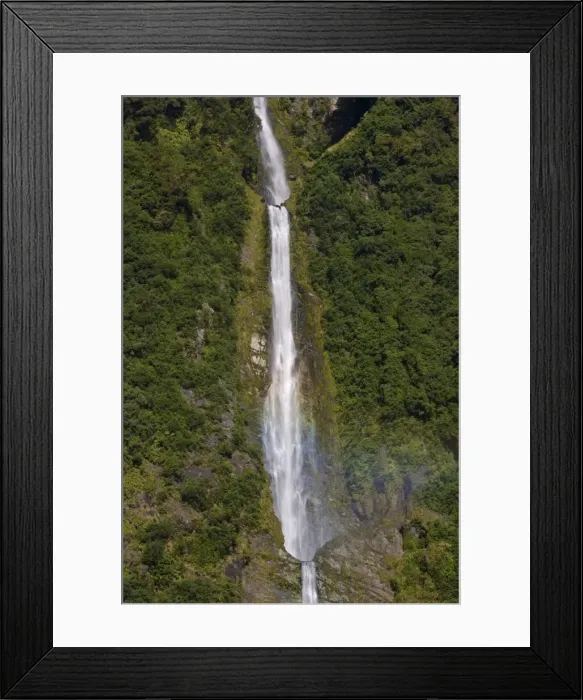 Framed Print : Humboldt Falls waters of Humboldt Falls drop 275 m down a steep cliff Hollyford Valley, Fjordland National Park, South Island, New Zealand