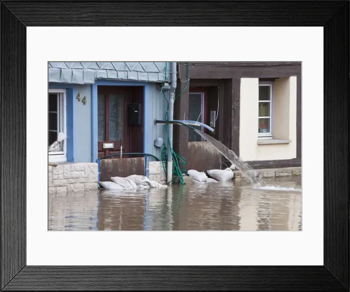 Framed Print : Flooding through Snowmelt - of Hann. Muenden Town after sudden thaw weather in winter - River Weser - Lower Saxony - Germany Framed Print : Flooding through Snowmelt - of Hann. Muenden Town after sudden thaw weather in winter - River Weser - Lower Saxony - Germany