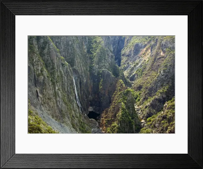 Framed Print : Wollomombi Falls - impressive view of this very high waterfall which drops in a very narrow and deep gorge into a plunge pool - Oxley Wild Rivers National Park, New South Wales, Australia Framed Print : Wollomombi Falls - impressive view of this very high waterfall which drops in a very narrow and deep gorge into a plunge pool - Oxley Wild Rivers National Park, New South Wales, Australia