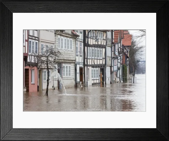 Framed Print : Flooding through Snowmelt - of Hann. Muenden Town after sudden thaw weather in winter - River Weser - Lower Saxony - Germany Framed Print : Flooding through Snowmelt - of Hann. Muenden Town after sudden thaw weather in winter - River Weser - Lower Saxony - Germany