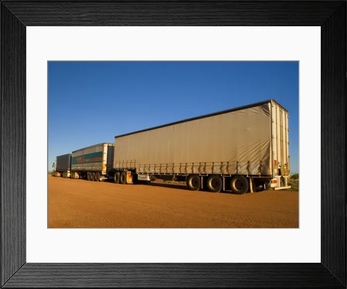 Framed Print : Roadtrain - a huge roadtrain with 3 trailers is a common sight in the outback of the Northern Territory and Western Australia. They can be up to 54 m long - Western Australia, Australia Framed Print : Roadtrain - a huge roadtrain with 3 trailers is a common sight in the outback of the Northern Territory and Western Australia. They can be up to 54 m long - Western Australia, Australia