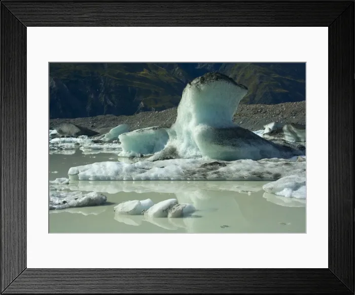 Framed Print : Icebergs thawing icebergs swimming in Tasman Glacier Lake Tasman Valley, Mount Cook National Park, South Island, New Zealand Framed Print : Icebergs thawing icebergs swimming in Tasman Glacier Lake Tasman Valley, Mount Cook National Park, South Island, New Zealand
