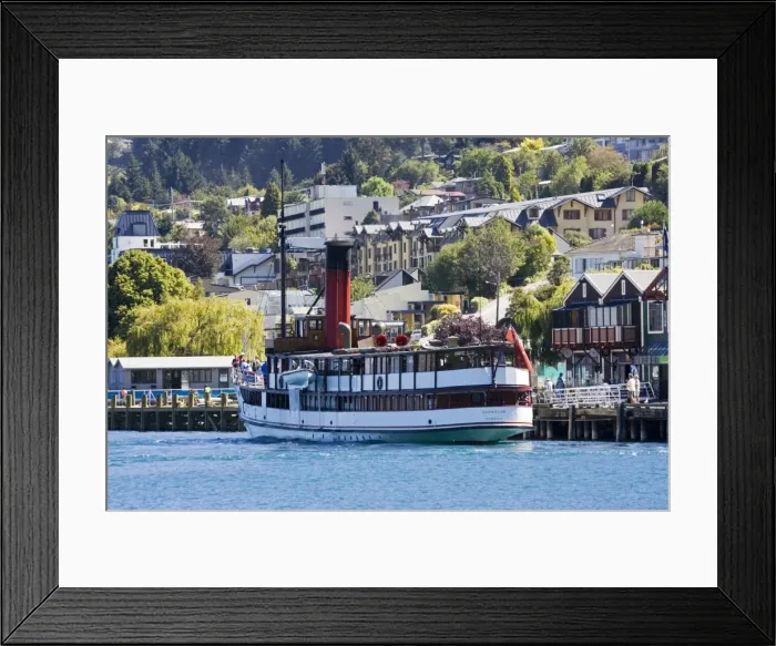 Framed Print : Boat - Vintage steamship TSS Earnslaw moored at quayside Lake Wakatipu Queenstown New Zealand. This elegant steamship is the last remaining coal-fired passenger vessel and a popular choice for tourists Framed Print : Boat - Vintage steamship TSS Earnslaw moored at quayside Lake Wakatipu Queenstown New Zealand. This elegant steamship is the last remaining coal-fired passenger vessel and a popular choice for tourists