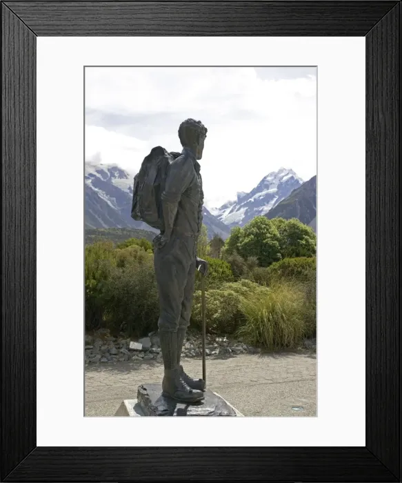 Framed Print : Bronze statue of Sir Edmund Hillary against snow capped mountains and forested slopes in Aoraki Mount Cook National Park. This spectacular wilderness area in South Island New Zealand has now been designated a World Heritage Site Framed Print : Bronze statue of Sir Edmund Hillary against snow capped mountains and forested slopes in Aoraki Mount Cook National Park. This spectacular wilderness area in South Island New Zealand has now been designated a World Heritage Site