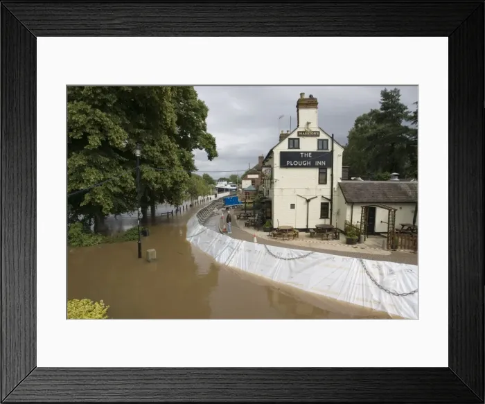 Framed Print : Flood barriers outside Plough Inn fooded alongside River Severn in spate June 27 2007 Upton upon Severn Worcs UK Framed Print : Flood barriers outside Plough Inn fooded alongside River Severn in spate June 27 2007 Upton upon Severn Worcs UK