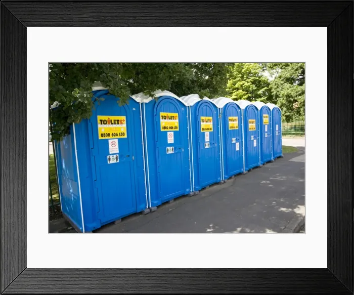 Framed Print : Row of blue Portaloos installed on pavement outside Woodmancote Junior School during water crisis when Mythe water treatment station in Tewkesbury was flooded July 2007 UK Framed Print : Row of blue Portaloos installed on pavement outside Woodmancote Junior School during water crisis when Mythe water treatment station in Tewkesbury was flooded July 2007 UK