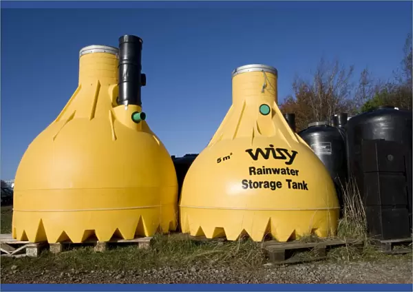 Tanks - Large yellow plastic Wisy rainwater storage tank. Green Shop Bisley UK