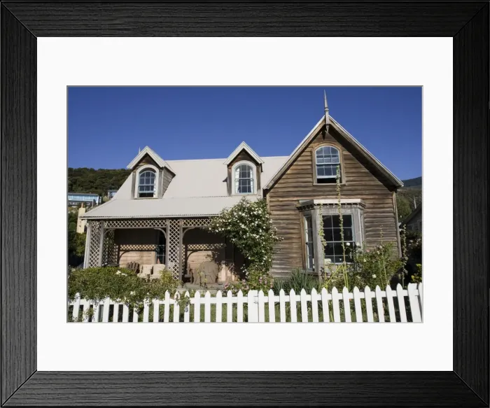 Framed Print : Building - Attractive old timber cottage. Akaroa harbour - Banks Peninsula - New Zealand Framed Print : Building - Attractive old timber cottage. Akaroa harbour - Banks Peninsula - New Zealand