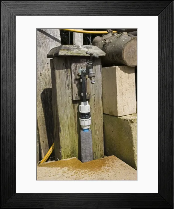 Framed Print : Garden Tap - Water dripping from outside brass tap UK Framed Print : Garden Tap - Water dripping from outside brass tap UK