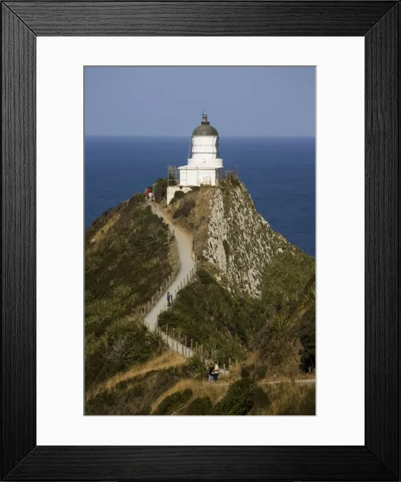 Framed Print : Lighthouse - New Zealand's southernmost lighthouse at Nugget Point. The Catlins South Island - New Zealand Framed Print : Lighthouse - New Zealand's southernmost lighthouse at Nugget Point. The Catlins South Island - New Zealand