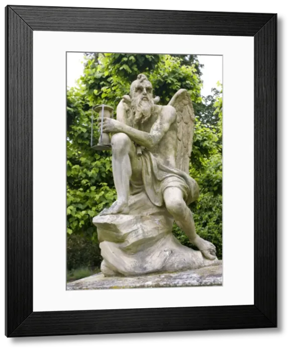 Framed Print : Stone statue of old Father Time Sandringham gardens near Kings Lynn Norfolk UK Framed Print : Stone statue of old Father Time Sandringham gardens near Kings Lynn Norfolk UK