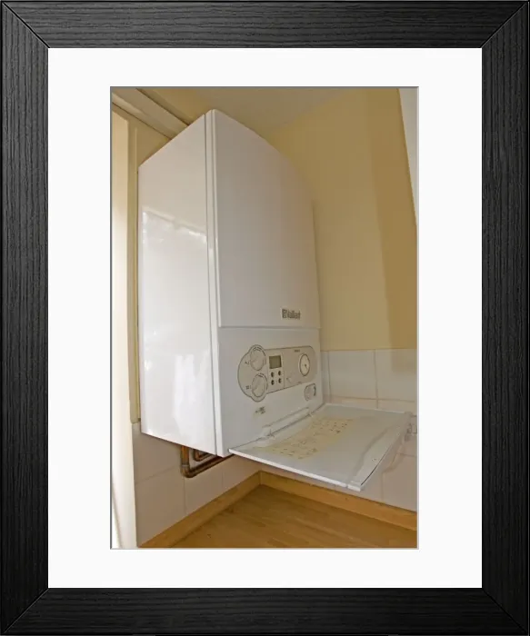 Framed Print : Bolier - Vaillant EcoTec Plus modern combination or compact combi boiler installed in small flat produces instant hot water UK Framed Print : Bolier - Vaillant EcoTec Plus modern combination or compact combi boiler installed in small flat produces instant hot water UK
