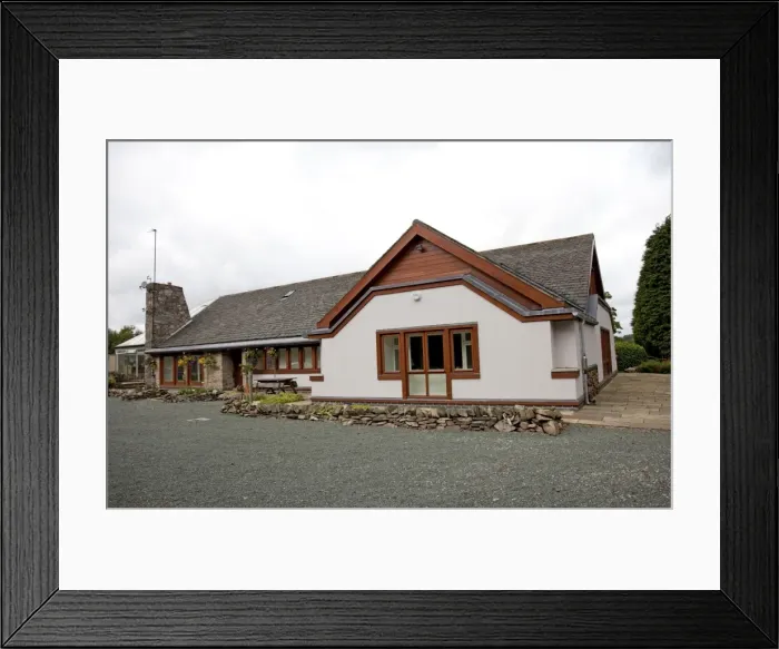 Framed Print : Eco-friendly Home - highly energy efficient bungalow with additional wall built of straw bales and rendered - UK Framed Print : Eco-friendly Home - highly energy efficient bungalow with additional wall built of straw bales and rendered - UK