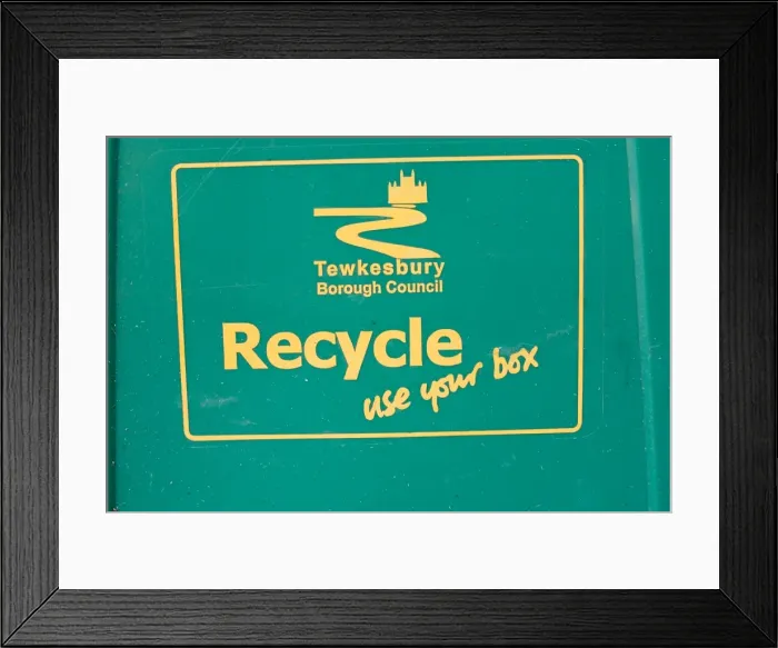 Framed Print : Close up of green recycle bin Cotswolds UK. Supplied with Tewkesbury Borough Council logo and use your box wording, for bottles and cans Cotswolds, UK Framed Print : Close up of green recycle bin Cotswolds UK. Supplied with Tewkesbury Borough Council logo and use your box wording, for bottles and cans Cotswolds, UK
