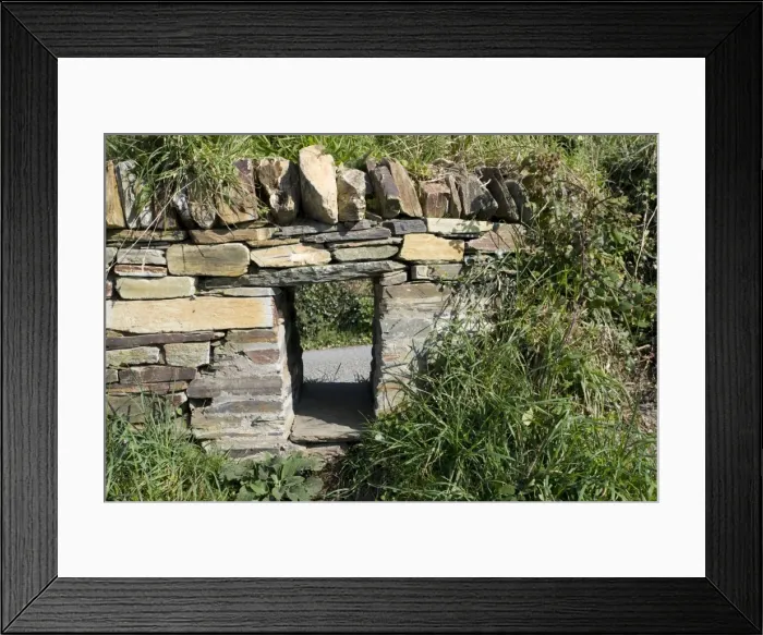 Framed Print : Badger access left in wall Tintagel North Cornwall Coast UK Framed Print : Badger access left in wall Tintagel North Cornwall Coast UK