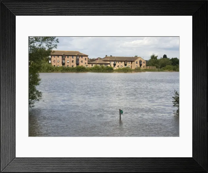 Framed Print : New houses built on flood plain with submerged footpath sign Newtown - Tewkesbury - Gloucestershire - UK following unprecedented flooding of Rivers Severn and Avon July 2007 Framed Print : New houses built on flood plain with submerged footpath sign Newtown - Tewkesbury - Gloucestershire - UK following unprecedented flooding of Rivers Severn and Avon July 2007