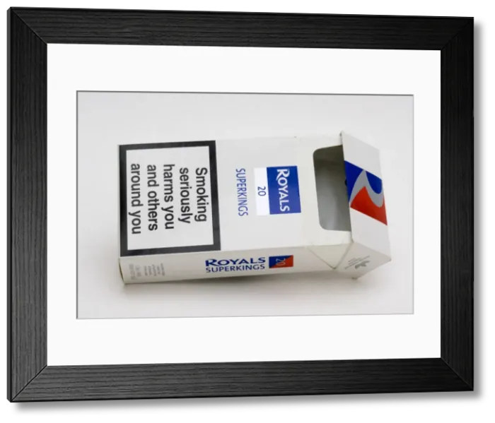 Framed Print : Cigarettes - Red white and blue packet of Royals Superkings cigarettes with smoking seriously damages health warning UK Framed Print : Cigarettes - Red white and blue packet of Royals Superkings cigarettes with smoking seriously damages health warning UK