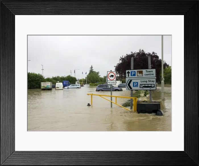 Framed Print : Flooding - Cars partly submerged in flooded car park opposite Tewkesbury Abbey - Gloucestershire UK in unprecedented floods of July 2007. Level of Rivers Avon and Severn almost at 1947 levels and at this point were still rising Framed Print : Flooding - Cars partly submerged in flooded car park opposite Tewkesbury Abbey - Gloucestershire UK in unprecedented floods of July 2007. Level of Rivers Avon and Severn almost at 1947 levels and at this point were still rising