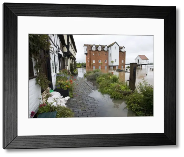 Framed Print : Flooding - Abbey Mill surrounded by flood River Avon opposite Tewkesbury Abbey Gloucestershire UK Level of Rivons Avon and Severn almost at 1947 levels and still rising Framed Print : Flooding - Abbey Mill surrounded by flood River Avon opposite Tewkesbury Abbey Gloucestershire UK Level of Rivons Avon and Severn almost at 1947 levels and still rising