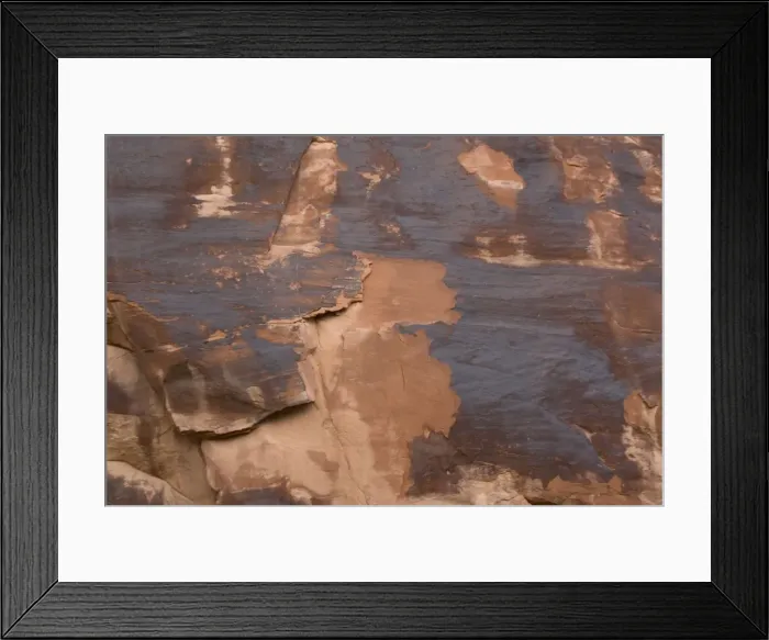 Framed Print : Rock varnish, formed on sandstone cliffs over long period by bacterial action, including deposition of manganese. Arches National Park, Utah Framed Print : Rock varnish, formed on sandstone cliffs over long period by bacterial action, including deposition of manganese. Arches National Park, Utah