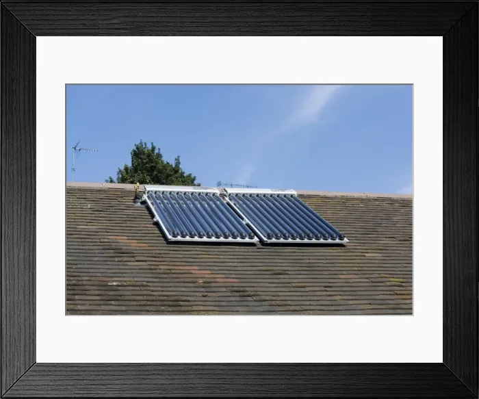 Framed Print : Solar thermal panels with evacuated tubes on roof of Worcestershire House provide domestic hot water UK Framed Print : Solar thermal panels with evacuated tubes on roof of Worcestershire House provide domestic hot water UK