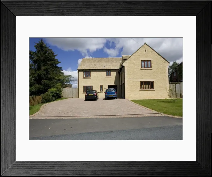Framed Print : Residential houses with large areas of paved frontage decreasing capacity for water absorption during heavy rain contribute to water run-off and flooding Cotswolds UK Framed Print : Residential houses with large areas of paved frontage decreasing capacity for water absorption during heavy rain contribute to water run-off and flooding Cotswolds UK