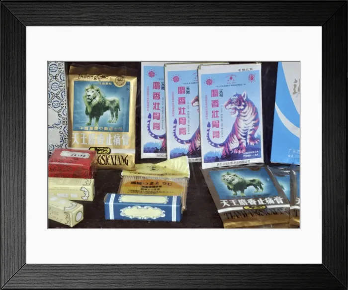 Framed Print : Selection of traditional Chinese medicine products featuring tiger parts and other animals Framed Print : Selection of traditional Chinese medicine products featuring tiger parts and other animals