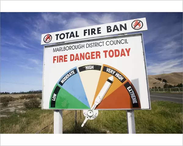 Sign - board on roadside displaying daily fire warning as very high South Island, New Zealand