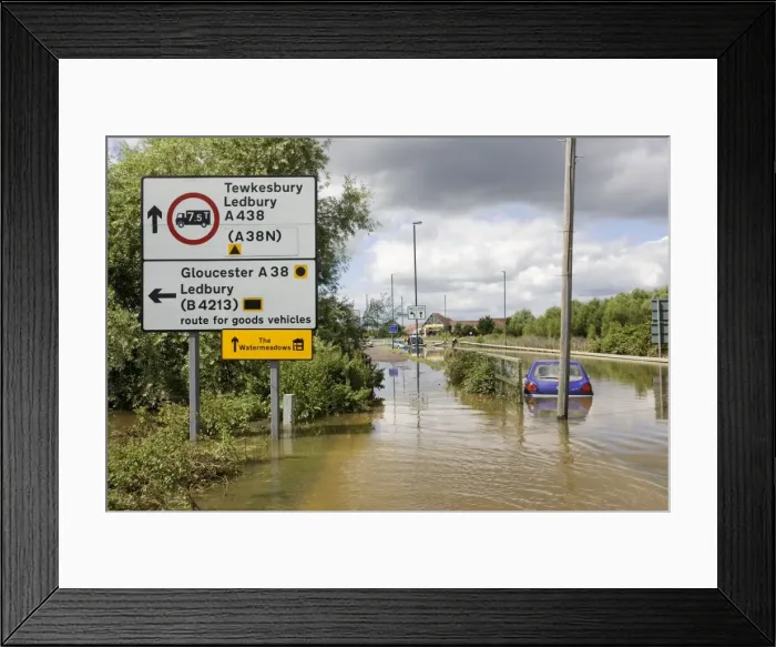 Framed Print : Flooding - cars partly submerged on flooded in Newtown, Tewkesbury Gloucestershire, UK with road sign to Watermeadows following unprecedented flooding of Rivons Avon and Severn above 1947 level Framed Print : Flooding - cars partly submerged on flooded in Newtown, Tewkesbury Gloucestershire, UK with road sign to Watermeadows following unprecedented flooding of Rivons Avon and Severn above 1947 level