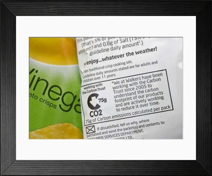 Framed Print : Carbon emissions label on Walkers Salt and vinegar crisp packet whose carbon footprint has been worked out in cooperation with the Carbon Trust UK Framed Print : Carbon emissions label on Walkers Salt and vinegar crisp packet whose carbon footprint has been worked out in cooperation with the Carbon Trust UK