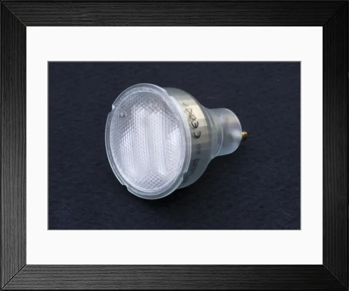 Framed Print : Lightbulb - These ultra efficient modern GU10 lamps are use only 7w of electricity to delivery around 35W of light Framed Print : Lightbulb - These ultra efficient modern GU10 lamps are use only 7w of electricity to delivery around 35W of light