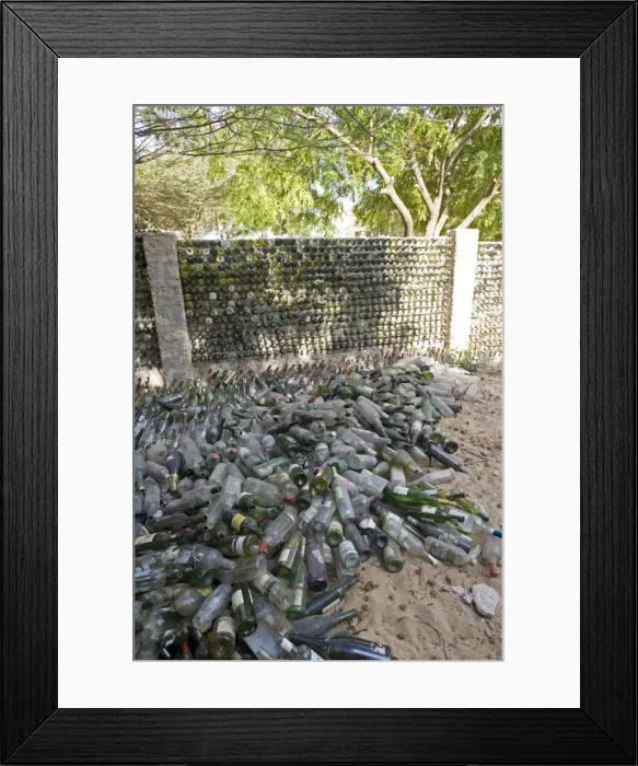 Framed Print : Recycling - wall built out of wine bottles. Lamu, Kenya Framed Print : Recycling - wall built out of wine bottles. Lamu, Kenya