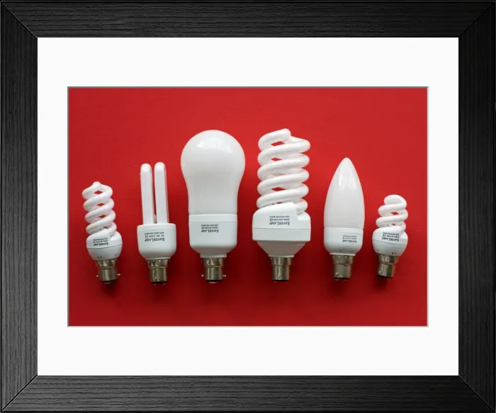 Framed Print : Low Enrgy Light Bulbs - variety of different sized low energy compact fluoresecent CF lamps UK Framed Print : Low Enrgy Light Bulbs - variety of different sized low energy compact fluoresecent CF lamps UK