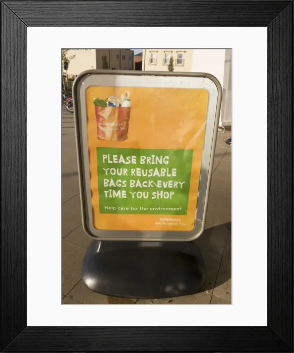 Framed Print : Poster encouraging reusable bags outside Sainsbury's Cheltenham UK Framed Print : Poster encouraging reusable bags outside Sainsbury's Cheltenham UK