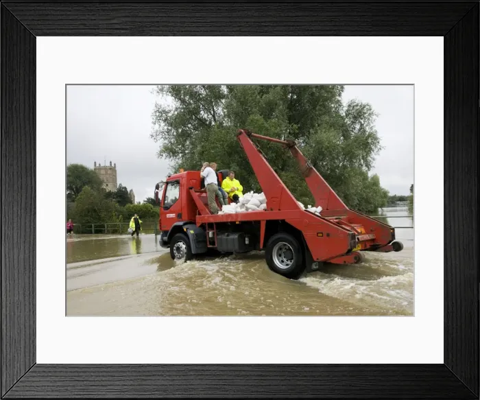 Framed Print : Flooding - Lorry carrying sand bags driving along flooded road opposite Tewkesbury Abbey Gloucestershire UK Level of Rivers Avon and Severn almost at 1947 levels on July 21 2007 and at time of photograher was still rising Framed Print : Flooding - Lorry carrying sand bags driving along flooded road opposite Tewkesbury Abbey Gloucestershire UK Level of Rivers Avon and Severn almost at 1947 levels on July 21 2007 and at time of photograher was still rising