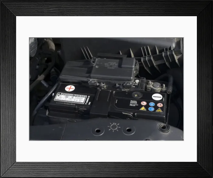 Framed Print : Battery - Vartade lead acid 12 volt 55 amp hour car battery in situ under bonnet UK Framed Print : Battery - Vartade lead acid 12 volt 55 amp hour car battery in situ under bonnet UK