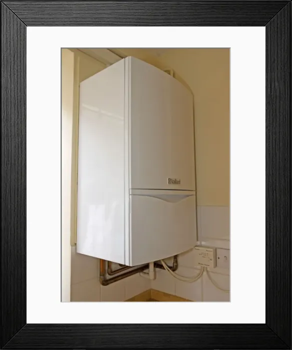 Framed Print : Boiler - vaillant EcoTec modern combination or compact combi boiler installed in small flat produces instant hot water UK Framed Print : Boiler - vaillant EcoTec modern combination or compact combi boiler installed in small flat produces instant hot water UK