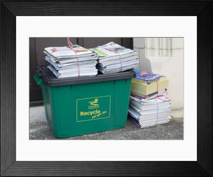 Framed Print : Bundles of magazines and newspapers neatly tied and left for recycling on green bin Cotswolds UK Framed Print : Bundles of magazines and newspapers neatly tied and left for recycling on green bin Cotswolds UK