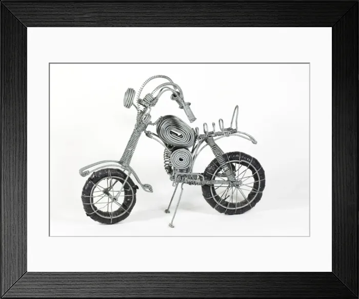 Framed Print : Model motorcycle made from soft steel wire made and sold by Kenyan street kids Africa Framed Print : Model motorcycle made from soft steel wire made and sold by Kenyan street kids Africa