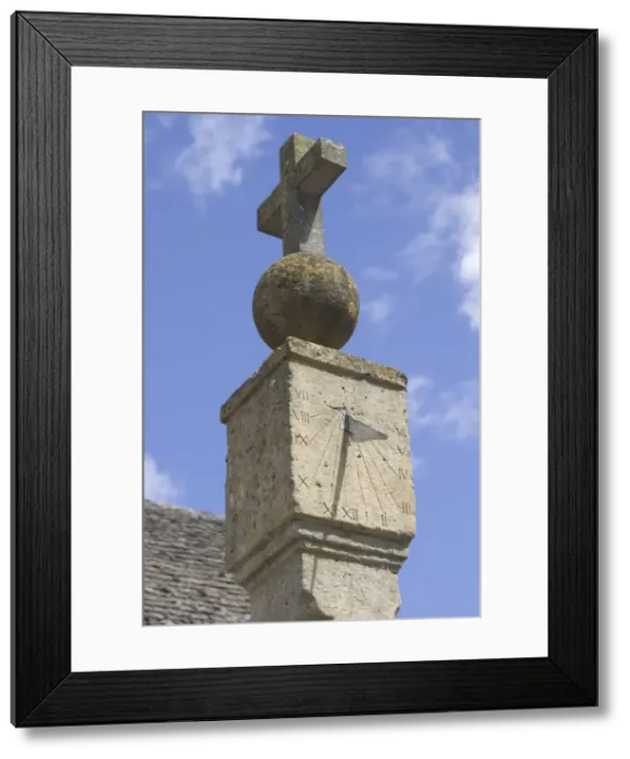 Framed Print : Sundial on medieval cross in Cotswold village of Stanton, Britain, UK Framed Print : Sundial on medieval cross in Cotswold village of Stanton, Britain, UK