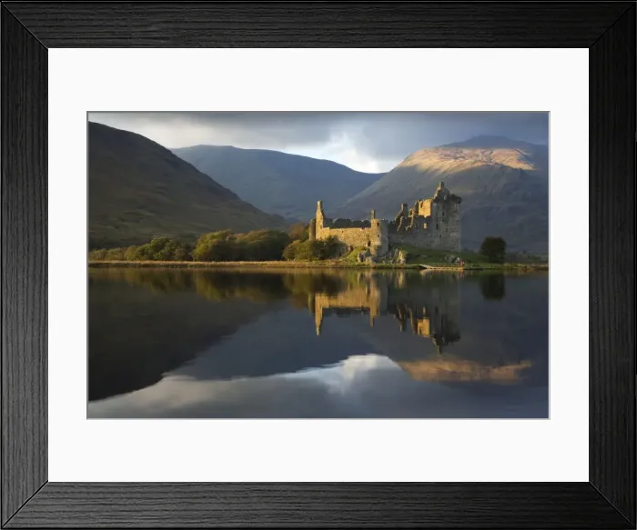 Framed Print : Kilchurn Castle in beautiful evening light reflected in Loch Awe - November - Scotland Framed Print : Kilchurn Castle in beautiful evening light reflected in Loch Awe - November - Scotland