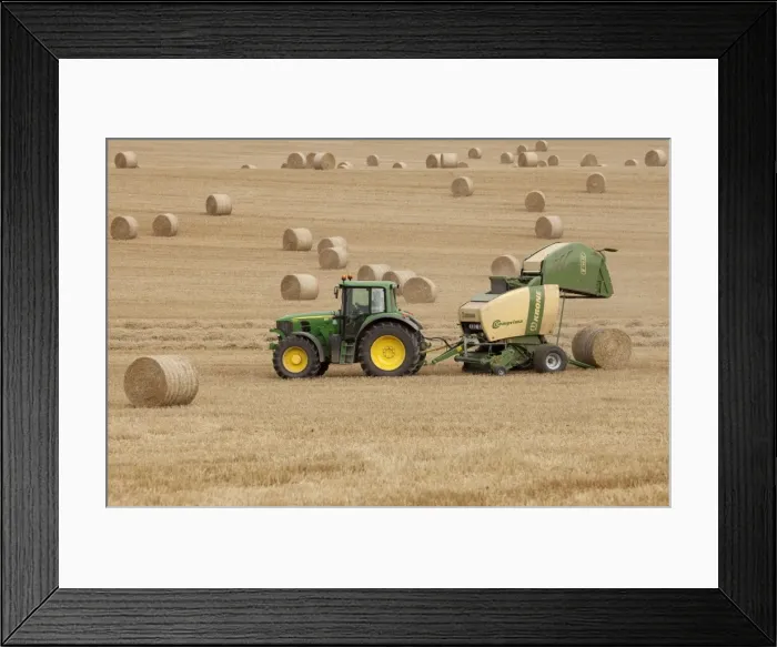Framed Print : Tractor stopping to allow hay bale making machine to release bale of hay - September - Staffordshire - England Framed Print : Tractor stopping to allow hay bale making machine to release bale of hay - September - Staffordshire - England