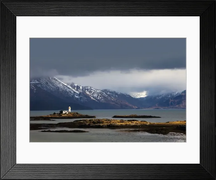 Framed Print : Lighthouse on the Isleornsay catching a moments sunshine in atmospheric conditions - Isle of Skye - Scotland Framed Print : Lighthouse on the Isleornsay catching a moments sunshine in atmospheric conditions - Isle of Skye - Scotland