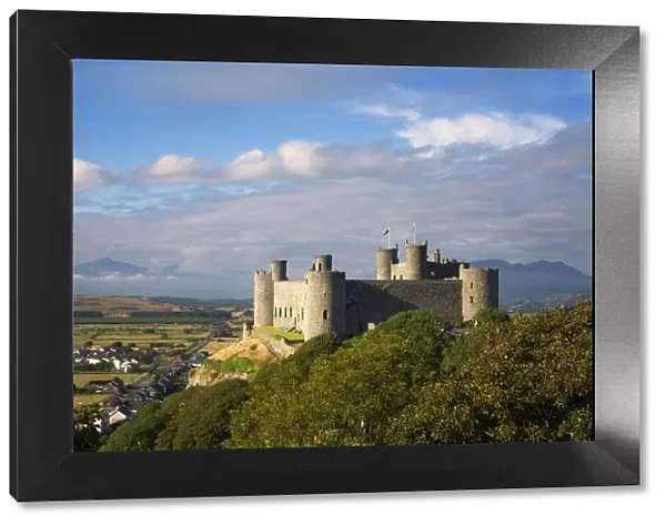 Harlech Castle - over looking Harlech village with Snowdon showing through the clouds in the distance - September - North Wales - UK