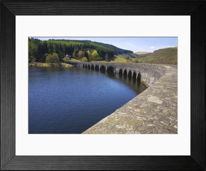 Framed Print : Careg Ddu dam is a completly submerged dam with a road going over the top to the other side of the lake - July - Elan Valley - Mid-Wales- UK Framed Print : Careg Ddu dam is a completly submerged dam with a road going over the top to the other side of the lake - July - Elan Valley - Mid-Wales- UK