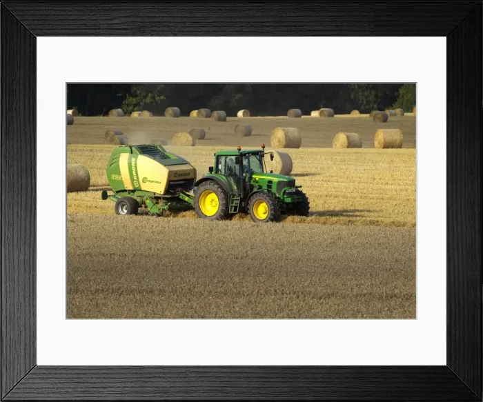 Framed Print : Tractor making bales of hay in freshly cut wheat field - September - Staffordshire - England