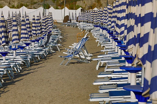 13132527. Beach chairs and umbrellas on the beach at Vietri Sul Mare