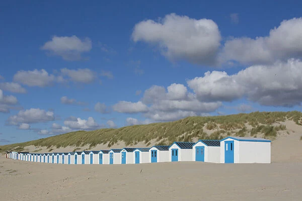 13132643. Colourful huts at the beach - island of Texel - Netherlands Date