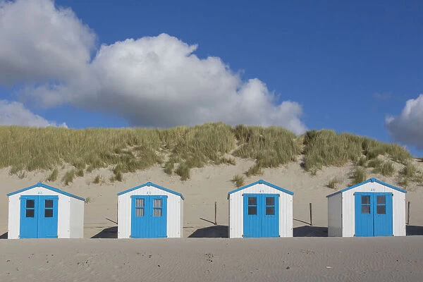 13132644. Colourful huts at the beach - island of Texel - Netherlands Date