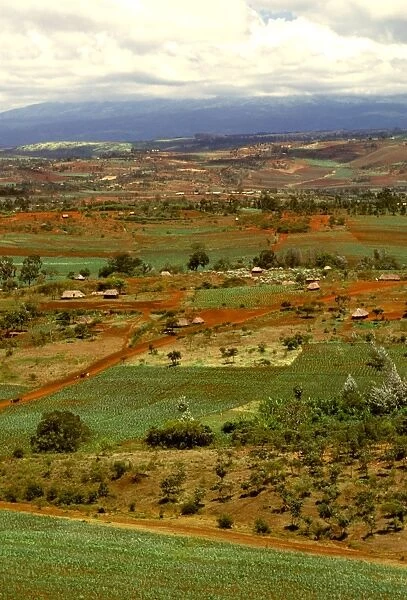 Aerial: cultivated land and human habitation near Ngorongoro Conservation Zone, Tanzania JFL14143